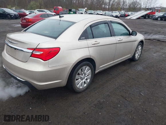 2014 Chrysler 200 LX with VIN 1C3CCBAB2EN213983, listed as a IAAI auction lot 42006774 with 80,615 mi miles and . Bid and sale history available at carsss.com. Image 4.