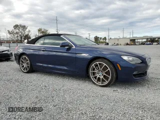 2012 BMW 6 Series 650i z VIN WBALZ3C50CDL70497, wystawiony jako Copart lot #82409164 z przebiegiem 17 982 mil mil oraz Szkoda całkowita • Salvage title. Historia ofert i sprzedaży dostępna na DreamBid. Obrazek 4.