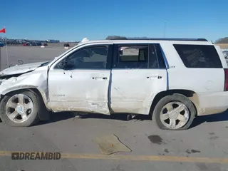 2016 Chevrolet Tahoe LTZ z VIN 1GNSKCKC0GR214110, wystawiony jako IAAI lot #41680822 z przebiegiem 60 271 mil mil oraz . Historia ofert i sprzedaży dostępna na DreamBid. Obrazek 15.