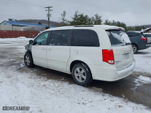 2011 Dodge Grand Caravan Mainstreet with VIN 2D4RN3DG7BR690603, listed as a IAAI auction lot 41271656 with 131,851 mi miles. Bid and sale history available at carsss.com. Image 3.