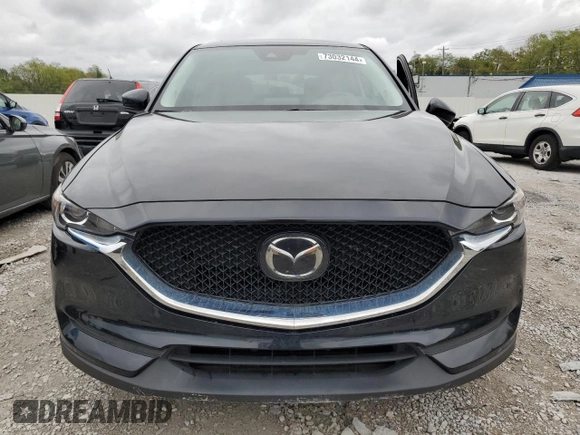 2020 Mazda CX-5 Touring with VIN JM3KFBCM1L0792706, listed as a Copart auction lot 73032144 with 56,845 mi miles and Salvage Title. Bid and sale history available at carsss.com. Image 5.