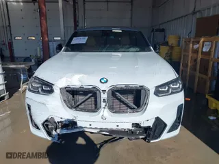 2023 BMW X4 M40i with VIN 5UX43DT03P9R26280, listed as a IAAI auction lot 41318355 with 21,587 mi miles. Bid and sale history available at carsss.com. Image 12.