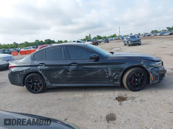 2021 BMW 5 Series 540i with VIN WBA53BJ03MCG98664, listed as a IAAI auction lot 42488708 with 64,101 mi miles and . Bid and sale history available at DreamBid. Image 12.