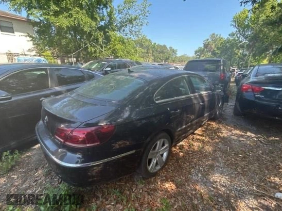 2013 Volkswagen CC Sport with VIN WVWBP7AN3DE504851, listed as a Copart auction lot 62174375 with 104,533 mi miles and Salvage title. Bid and sale history available at DreamBid. Image 4.