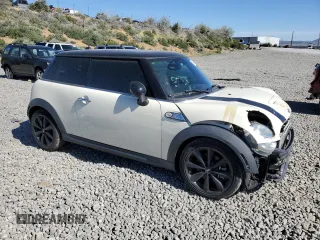 2013 MINI Hardtop S with VIN WMWSV3C52DT389468, listed as a Copart auction lot 57293845 with 84,723 mi miles and Salvage title. Bid and sale history available at DreamBid. Image 4.