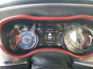 2018 Dodge Charger Daytona with VIN 2C3CDXCT4JH283018, listed as a Copart auction lot 48707905 with 121,624 mi miles and Salvage title. Bid and sale history available at DreamBid. Image 9.