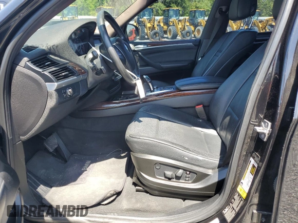 2011 BMW X5 35d with VIN 5UXZW0C58BL662048, listed as a Copart auction lot 55648975 with 166,291 mi miles and Salvage title. Bid and sale history available at DreamBid. Image 7.