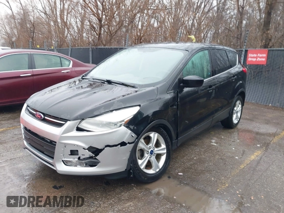 2014 Ford Escape SE with VIN 1FMCU0GX4EUE39511, listed as a IAAI auction lot 41477507 with 151,532 mi miles and . Bid and sale history available at DreamBid. Image 2.
