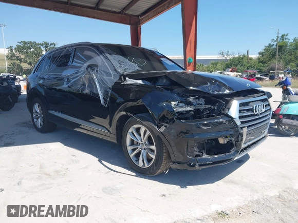 2017 Audi Q7 Premium Plus with VIN WA1LHAF75HD040203, listed as a IAAI auction lot 42064687 with 100,845 mi miles and . Bid and sale history available at DreamBid. Image 1.