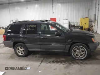 1999 Jeep Grand Cherokee Laredo with VIN 1J4GW58SXXC649579, listed as a IAAI auction lot 42365959 with 199,742 mi miles and . Bid and sale history available at DreamBid. Image 13.