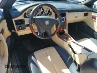 2003 Mercedes-Benz SLK 320 with VIN WDBKK65F03F286130, listed as a Copart auction lot 61544385 with 98,899 mi miles and Salvage title. Bid and sale history available at DreamBid. Image 8.