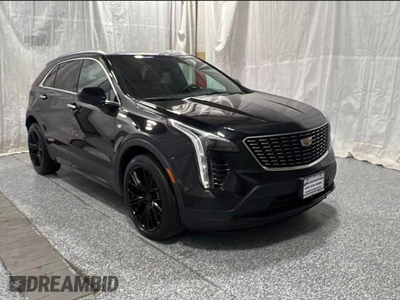 2019 Cadillac XT4 FWD Premium Luxury with VIN 1GYFZCR45KF142250, listed as a Copart auction lot 63934705 with 92,410 mi miles and Clean title. Bid and sale history available at DreamBid. Image 1.