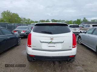 2014 Cadillac SRX Performance Collection with VIN 3GYFNCE34ES519059, listed as a IAAI auction lot 42237351 with 80,578 mi miles and . Bid and sale history available at DreamBid. Image 17.