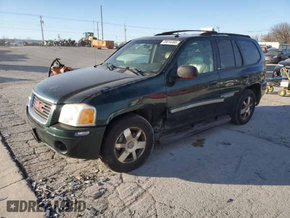 2004 GMC Envoy SLE with VIN 1GKDT13S142197514, listed as a Copart auction lot 89014465 with 202,790 mi miles and Salvage Title. Bid and sale history available at carsss.com. Image 1.
