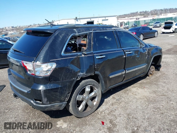 2013 Jeep Grand Cherokee Overland with VIN 1C4RJFCT2DC536899, listed as a IAAI auction lot 41853217 with 1 mi miles. Bid and sale history available at carsss.com. Image 4.