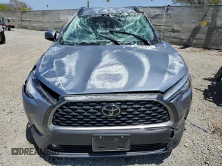 2022 Toyota Corolla Cross XLE with VIN 7MUEAAAG3NV012240, listed as a Copart auction lot 54125225 with 16,204 mi miles and Salvage title. Bid and sale history available at DreamBid. Image 5.