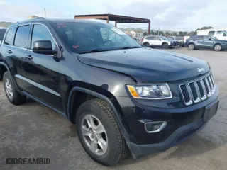 2014 Jeep Grand Cherokee Laredo with VIN 1C4RJFAG9EC516138, listed as a IAAI auction lot 42055214 with 135,701 mi miles. Bid and sale history available at carsss.com. Image 1.