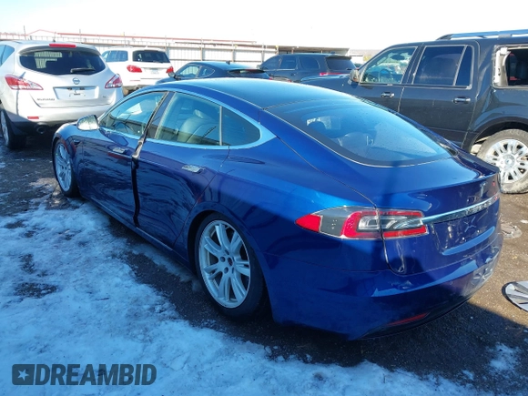 2020 Tesla Model S Long Range with VIN 5YJSA1E26LF410779, listed as a IAAI auction lot 41241192 with 68,764 mi miles and . Bid and sale history available at DreamBid. Image 3.