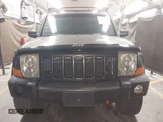 2006 Jeep Commander with VIN 1J8HG48KX6C263348, listed as a IAAI auction lot 42128039 with 208,605 mi miles and . Bid and sale history available at DreamBid. Image 13.