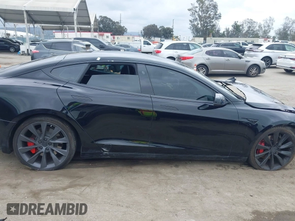 2017 Tesla Model S 60 with VIN 5YJSA1E12HF195965, listed as a IAAI auction lot 41946148 with 63,992 mi miles and . Bid and sale history available at DreamBid. Image 13.