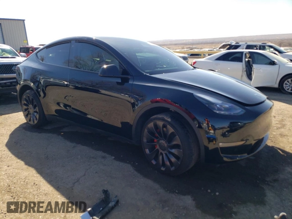 2023 Tesla Model Y Performance with VIN 7SAYGDEF3PF773031, listed as a Copart auction lot 47105765 with 25,604 mi miles and Salvage Title. Bid and sale history available at DreamBid. Image 4.