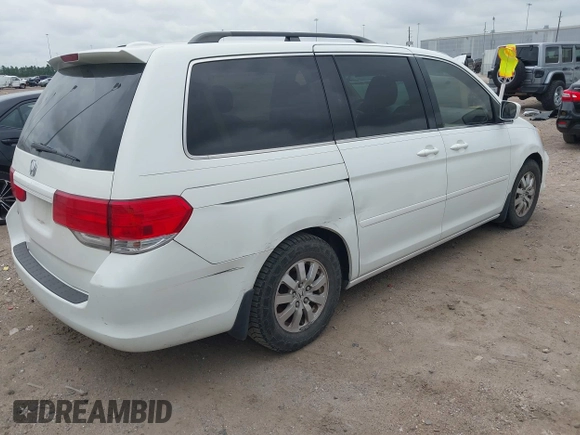 2010 Honda Odyssey EX-L z VIN 5FNRL3H78AB030254, wystawiony jako IAAI lot #42742510 z przebiegiem 277 913 mil mil oraz . Historia ofert i sprzedaży dostępna na DreamBid. Obrazek 4.