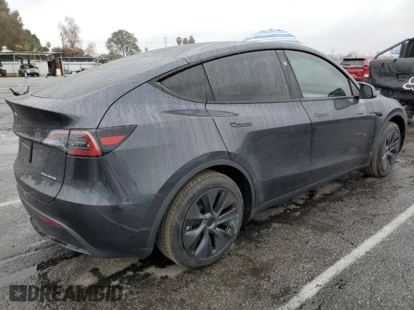 2025 Tesla Model Y Long Range with VIN 7SAYGAEE3SF216635, listed as a Copart auction lot 44614555 with 400 mi miles and Salvage Title. Bid and sale history available at DreamBid. Image 3.