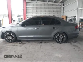 2016 Volkswagen Jetta Sport z VIN 3VWD17AJ3GM416482, wystawiony jako IAAI lot #41653790 z przebiegiem 109 380 mil mil oraz . Historia ofert i sprzedaży dostępna na DreamBid. Obrazek 13.