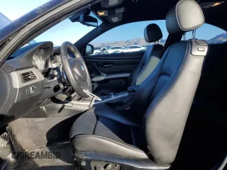 2012 BMW 3 Series 335i with VIN WBAKG7C5XCE803150, listed as a Copart auction lot 76390994 with 113,731 mi miles and Salvage Title. Bid and sale history available at carsss.com. Image 7.