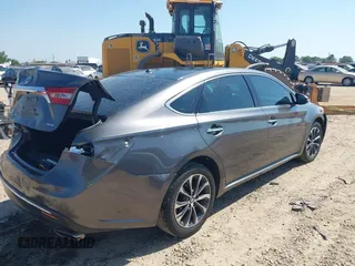 2018 Toyota Avalon XLE with VIN 4T1BK1EB1JU285770, listed as a IAAI auction lot 42073553 with 71,809 mi miles and . Bid and sale history available at DreamBid. Image 4.
