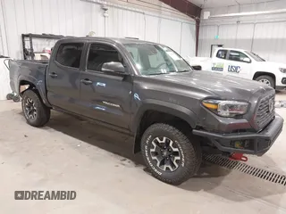 2023 Toyota Tacoma SR with VIN 3TYCZ5AN0PT178013, listed as a IAAI auction lot 42180865 with 19,355 mi miles and . Bid and sale history available at DreamBid. Image 1.
