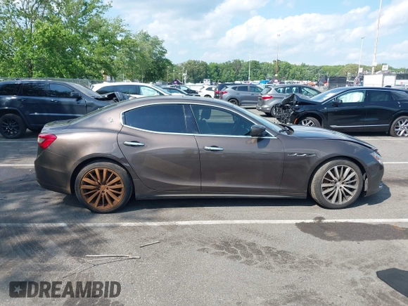 2015 Maserati Ghibli S Q4 with VIN ZAM57RTA7F1154097, listed as a IAAI auction lot 42568564 with 113,436 mi miles and . Bid and sale history available at DreamBid. Image 12.