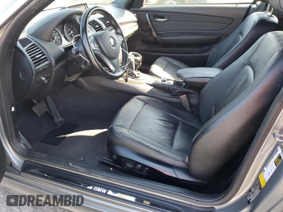 2012 BMW 1 Series 128i with VIN WBAUN1C5XCVR00151, listed as a Copart auction lot 56040445 with 171,302 mi miles and Salvage title. Bid and sale history available at DreamBid. Image 7.