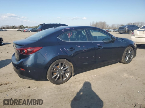 2014 Mazda 3 S Touring with VIN JM1BM1V35E1154890, listed as a Copart auction lot 42291245 with 93,749 mi miles and Salvage Title. Bid and sale history available at DreamBid. Image 3.
