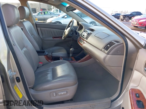2004 Toyota Camry LE with VIN 4T1BF30K24U577908, listed as a IAAI auction lot 41591147 with 151,678 mi miles and . Bid and sale history available at DreamBid. Image 5.
