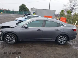 2020 Honda Insight Touring with VIN 19XZE4F98LE011149, listed as a IAAI auction lot 41834043 with 54,251 mi miles and . Bid and sale history available at carsss.com. Image 15.