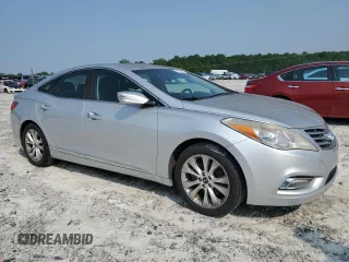 2013 Hyundai Azera z VIN KMHFG4JG9DA252768, wystawiony jako Copart lot #59143035 z przebiegiem 118 260 mil mil oraz Czysty tytuł • Clean title. Historia ofert i sprzedaży dostępna na DreamBid. Obrazek 4.