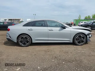2023 Kia K5 GT-Line z VIN 5XXG64J26PG176483, wystawiony jako IAAI lot #42154614 z przebiegiem 61 050 mil mil oraz . Historia ofert i sprzedaży dostępna na DreamBid. Obrazek 13.