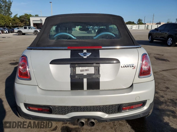 2013 MINI Convertible S with VIN WMWZP3C50DT550800, listed as a Copart auction lot 42409015 with 101,421 mi miles and Salvage title. Bid and sale history available at DreamBid. Image 6.