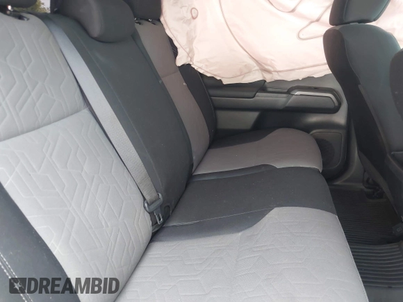 2023 Toyota Tacoma SR with VIN 3TMCZ5AN0PM635933, listed as a IAAI auction lot 42543126 with 32,960 mi miles and . Bid and sale history available at DreamBid. Image 8.