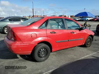 2001 Ford Focus LX with VIN 1FAFP33P91W151083, listed as a Copart auction lot 48943555 with 157,848 mi miles and Salvage Title. Bid and sale history available at carsss.com. Image 3.