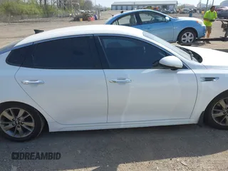 2016 Kia Optima LX Turbo with VIN 5XXGT4L10GG037107, listed as a IAAI auction lot 42071593 with 152,919 mi miles. Bid and sale history available at carsss.com. Image 13.