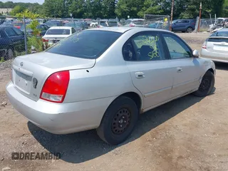 2003 Hyundai Elantra GLS z VIN KMHDN45D63U571345, wystawiony jako IAAI lot #39897105 z przebiegiem 156 805 mil mil oraz . Historia ofert i sprzedaży dostępna na DreamBid. Obrazek 4.