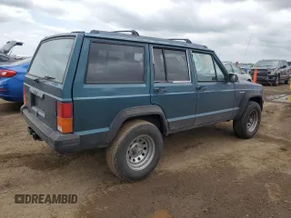 1996 Jeep Cherokee Sport with VIN 1J4FJ68S3TL251074, listed as a Copart auction lot 59593955 with 181,482 mi miles and Salvage title. Bid and sale history available at DreamBid. Image 3.