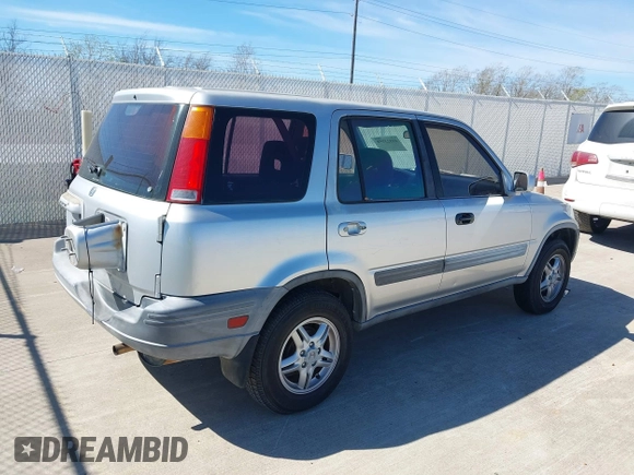 1999 Honda CR-V EX with VIN JHLRD1867XC060816, listed as a IAAI auction lot 41823958 with 220,322 mi miles. Bid and sale history available at carsss.com. Image 4.