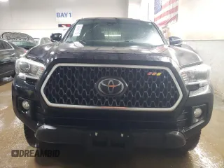 2018 Toyota Tacoma SR with VIN 3TMCZ5AN8JM157719, listed as a Copart auction lot 50548715 with 107,453 mi miles and Salvage Title. Bid and sale history available at carsss.com. Image 5.