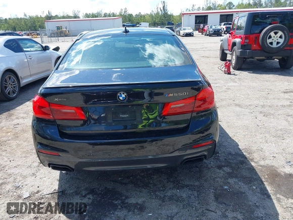 2019 BMW 5 Series M550i xDrive with VIN WBAJB9C51KB289355, listed as a IAAI auction lot 41867984 with 30,106 mi miles and . Bid and sale history available at DreamBid. Image 16.