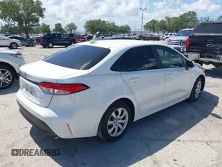 2023 Toyota Corolla LE with VIN 5YFB4MDE1PP058810, listed as a IAAI auction lot 42009318 with 10,950 mi miles and . Bid and sale history available at carsss.com. Image 4.