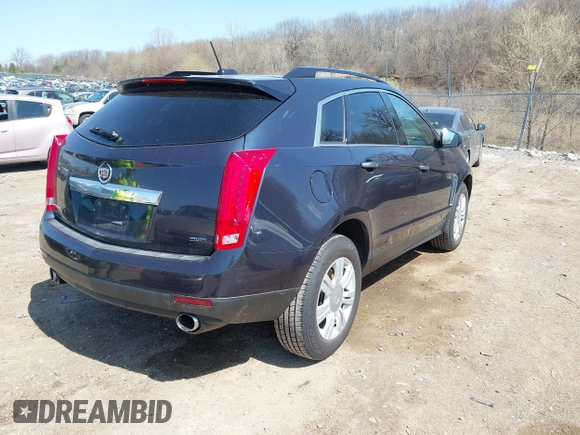 2015 Cadillac SRX with VIN 3GYFNAE39FS571065, listed as a IAAI auction lot 42029749 with 146,098 mi miles and . Bid and sale history available at DreamBid. Image 4.