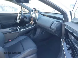 2023 Toyota bZ4X XLE z VIN JTMABACA5PA035744, wystawiony jako IAAI lot #41264742 z przebiegiem 27 792 mil mil oraz . Historia ofert i sprzedaży dostępna na DreamBid. Obrazek 5.